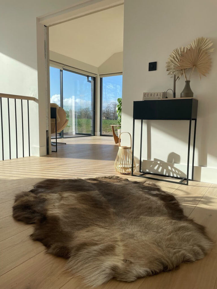 Reindeer hide on floor scandi setting