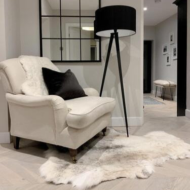 Rare breed Nordic reindeer hide rug in white, grey, and beige tones