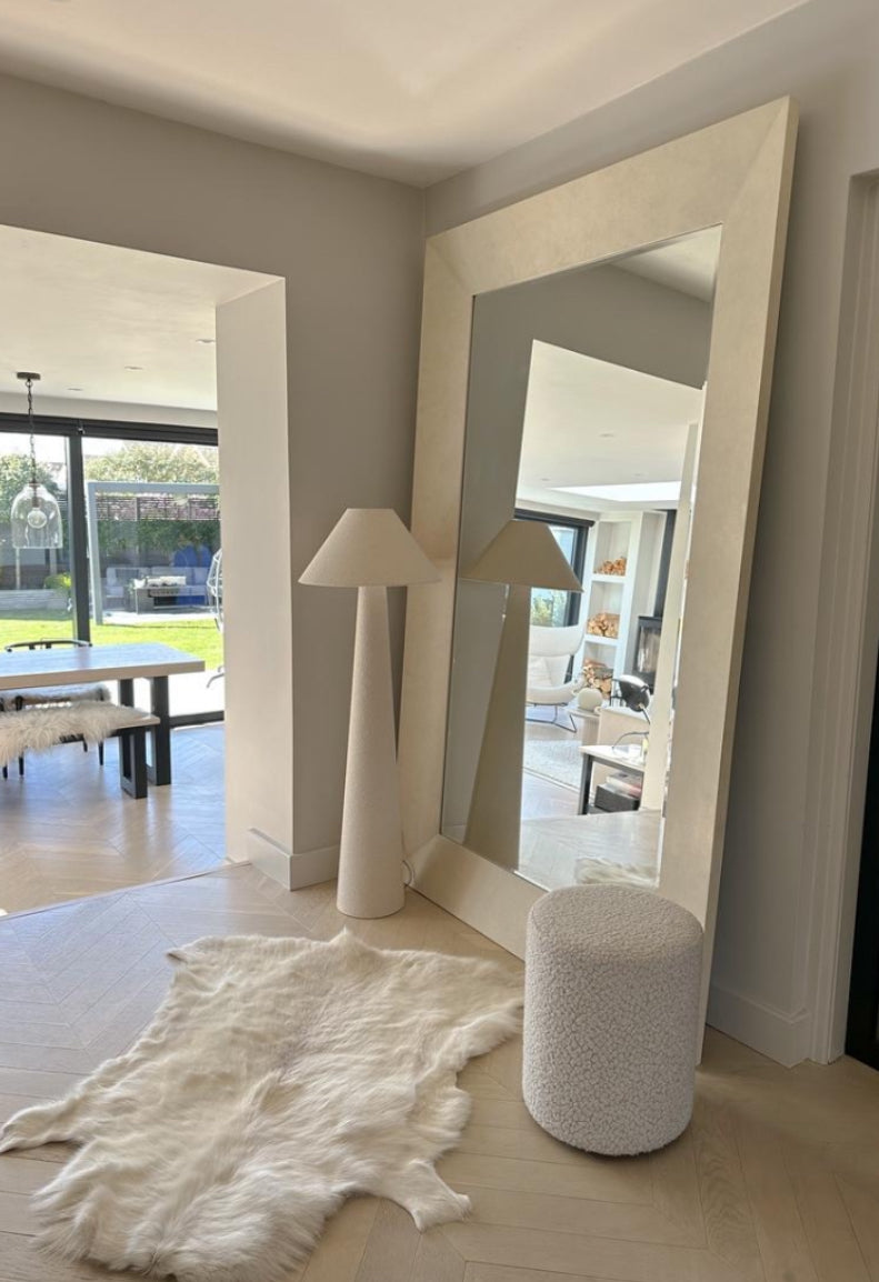 reindeer hide on floor by mirror