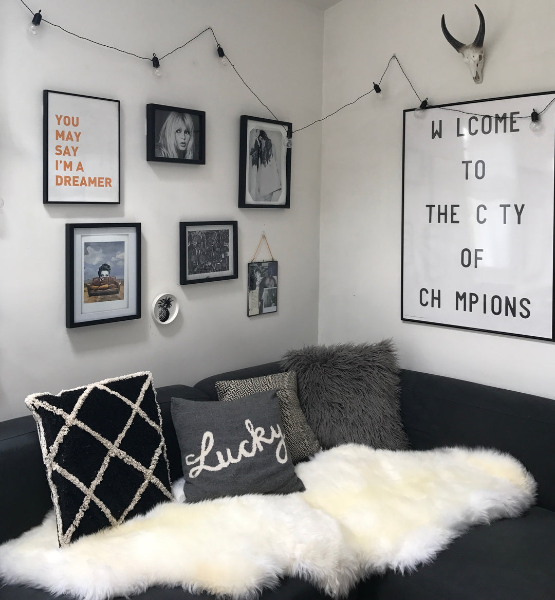white double sheepskin on sofa