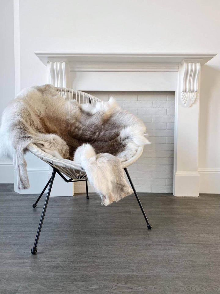 Ethically sourced reindeer hide rug with soft texture and unique markings