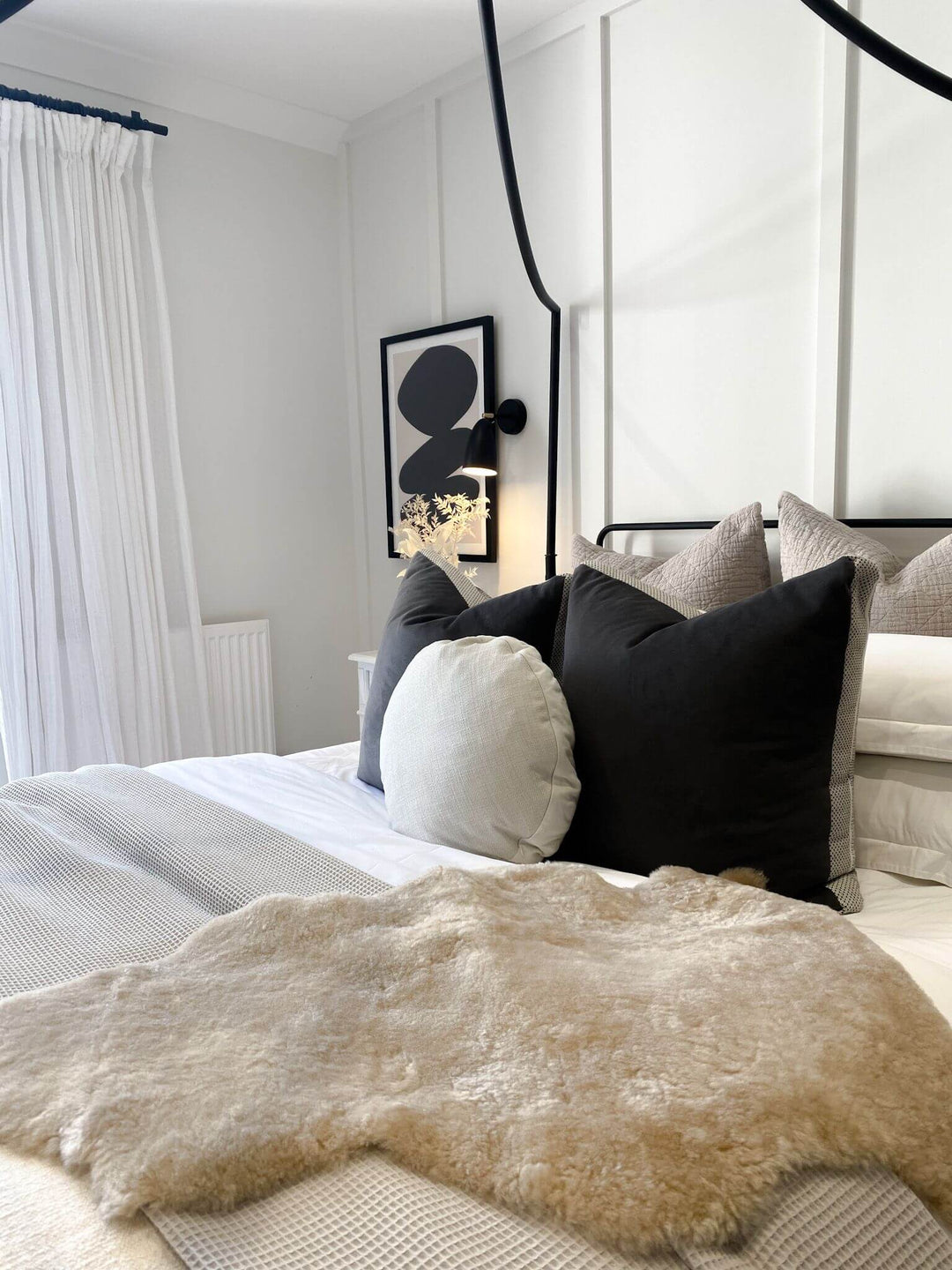 Oyster sheepskin on bed 